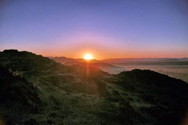 namibia-windhoek-farm-sonnenuntergang-ntb